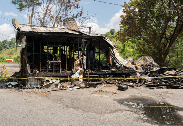 istock Burned ruins of wooden frame home 815198884