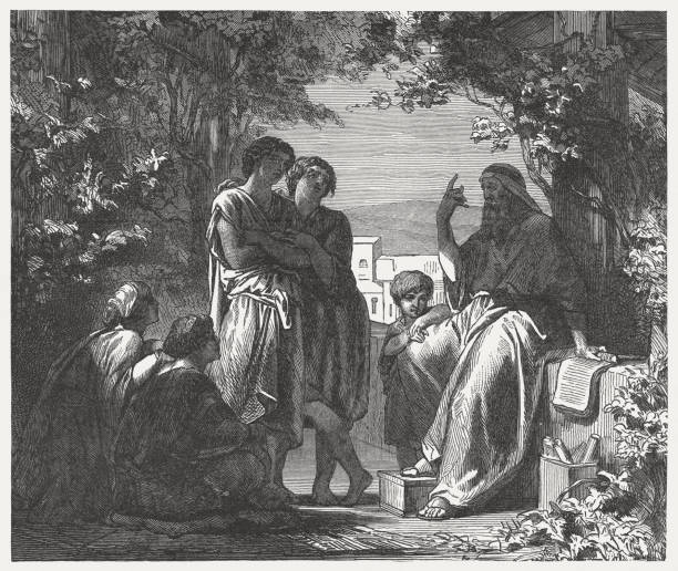 istock Father teaches his children (Deuteronomy 6), wood engraving, published 1886 815203582