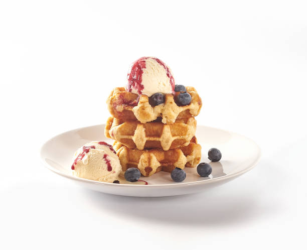istock Close up of sweet waffles on white 815215666