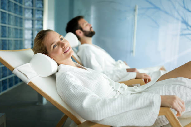 istock Handsome man and beautiful woman relaxing in spa 815229710