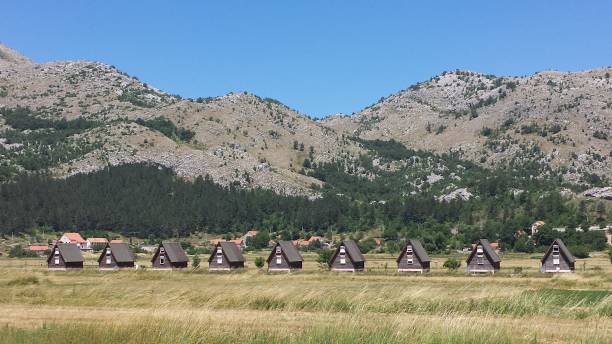 dorf in njegusi, montenegro - eastern europe mountain range mountain village stock-fotos und bilder