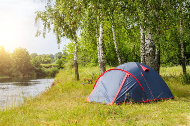 istock Tent in the camp near the river . 815247734