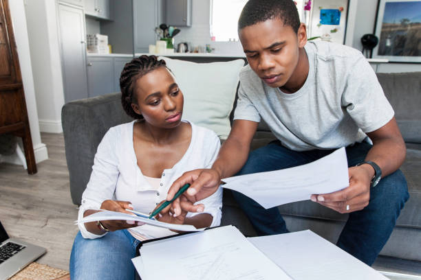 istock Beautiful couple working on their finances together. 815256874