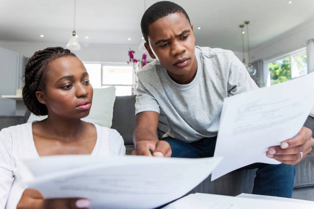 istock Young couple working on their finances together. 815259006