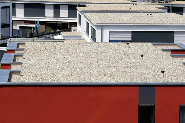 Residential building with flat roof with gravel