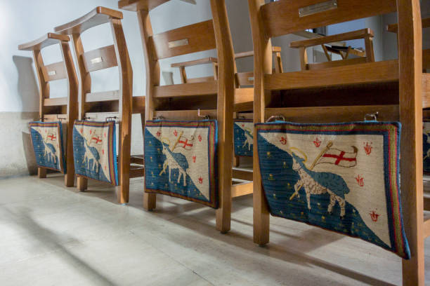 Tapestry Kneelers Guildford, Surrey, January 29, 2015 - Tapestry kneelers in the chapel of the Queen's Royal Surrey Regiment, Guildford cathedral kneelers stock pictures, royalty-free photos & images