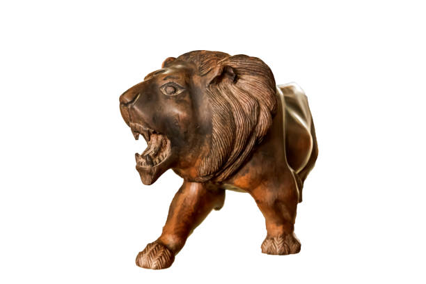 Lion figure carved wood. on white background