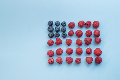 American flag made by blueberries and raspberries