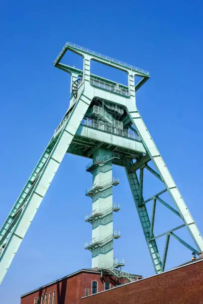 Headframe of German Mining Museum in Bochum, Germany with blue sky