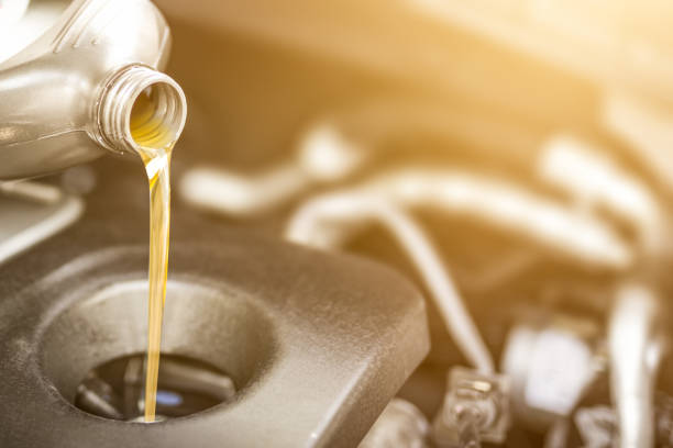 Motor oil pouring.