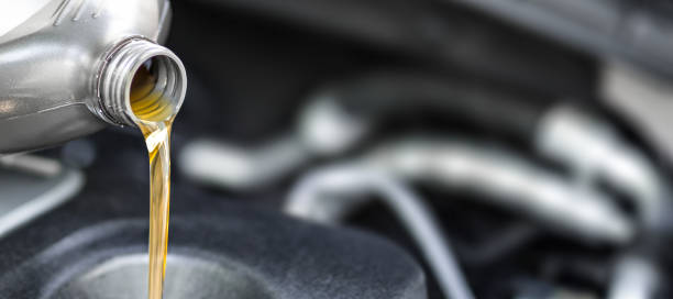 istock Motor oil pouring. 815292566