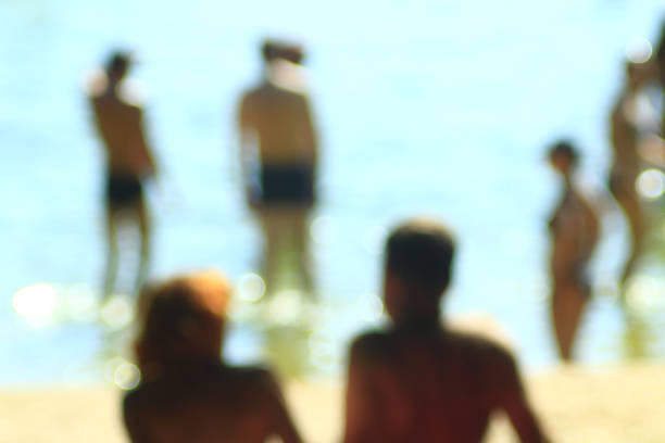 istock blurred image of people relax and sunbathe on the river 815303580
