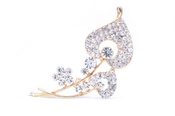 istock gold brooch with diamonds isolated on white 815303786