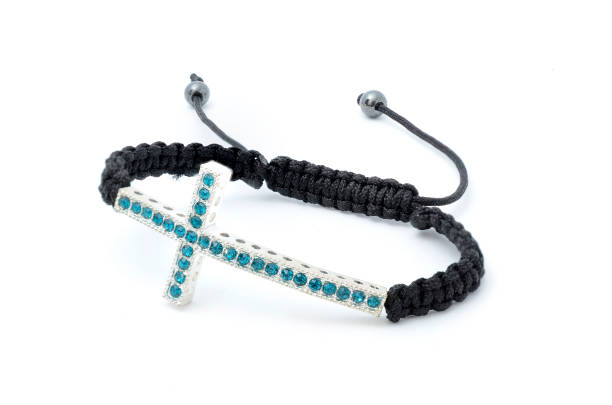 istock Bracelet with a cross isolated 815328676