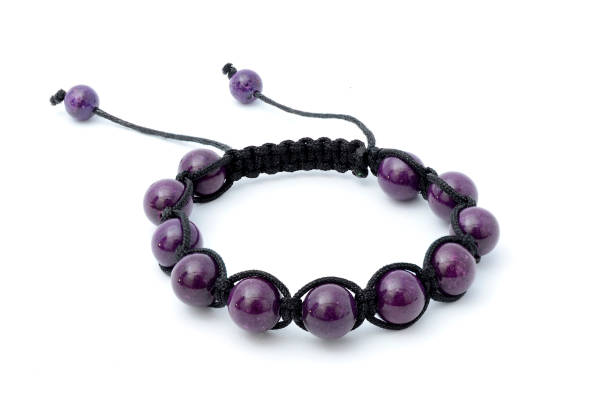 istock Purple bracelet isolated 815328694