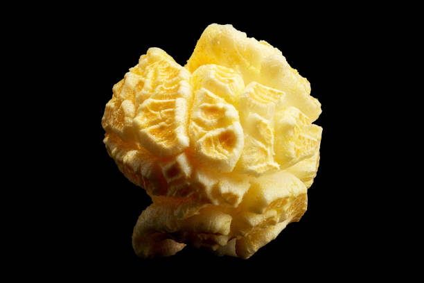 Popped popcorn isolated on a black background