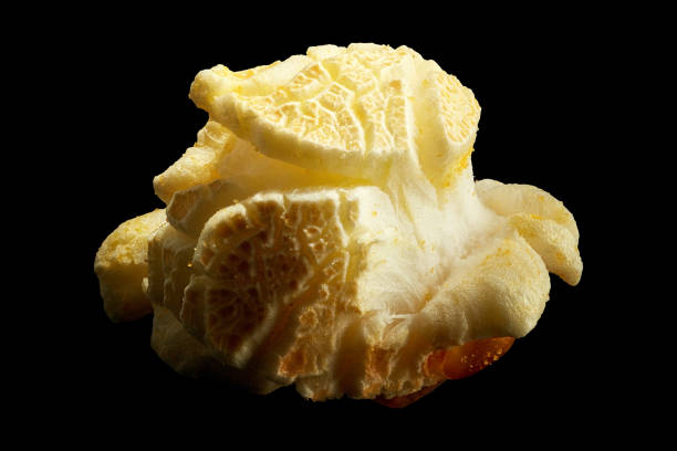 Popped popcorn isolated on a black background