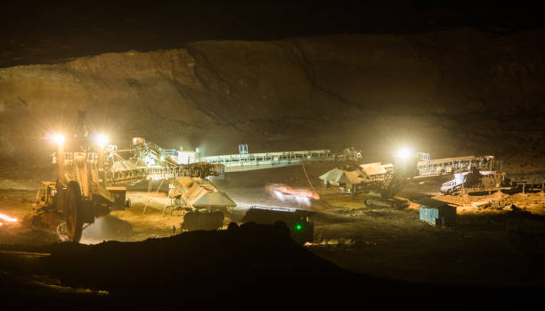 istock Part of a pit with big mining truck working 815344364
