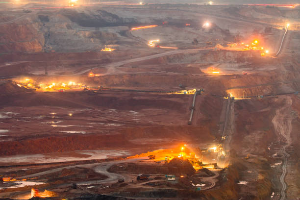 istock Part of a pit with big mining truck working 815344388