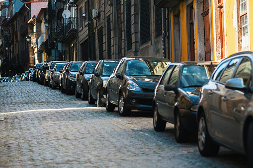 Cars parked along the streets of the old town.