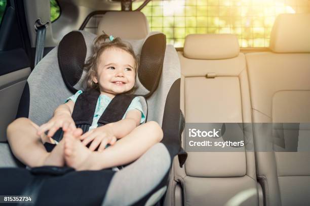 Infant Baby Girl Buckled Into Her Car Seat Stock Photo - Download Image Now - Car, Child, Car Safety Seat