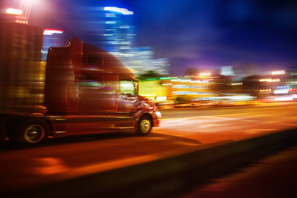 istock Semi-truck at night 815352742