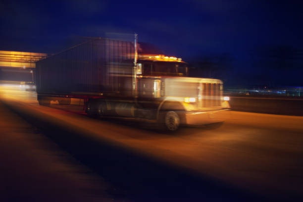 istock Semi-truck at night 815352928
