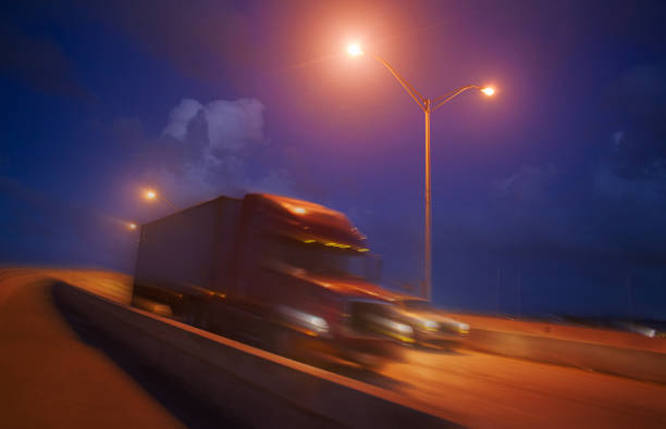 istock Semi-truck at night 815353208