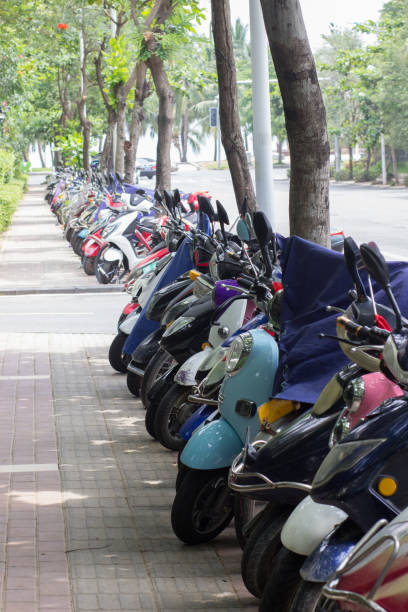 istock Scooter parking along the road in China 815353570