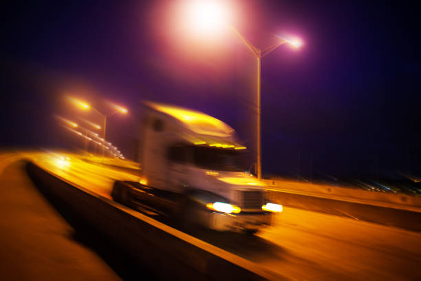 istock Semi-truck at night 815355814