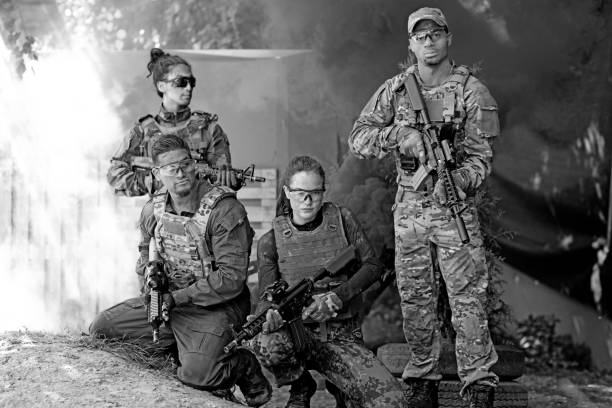 istock Group of 4 soldiers training in outdoor setting 815367968