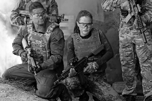 istock Group of 4 soldiers training in outdoor setting 815367972