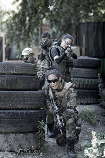 istock Group of 4 soldiers training in outdoor setting 815367986