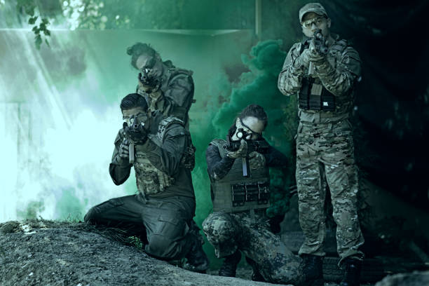istock Group of 4 soldiers training in outdoor setting 815368006