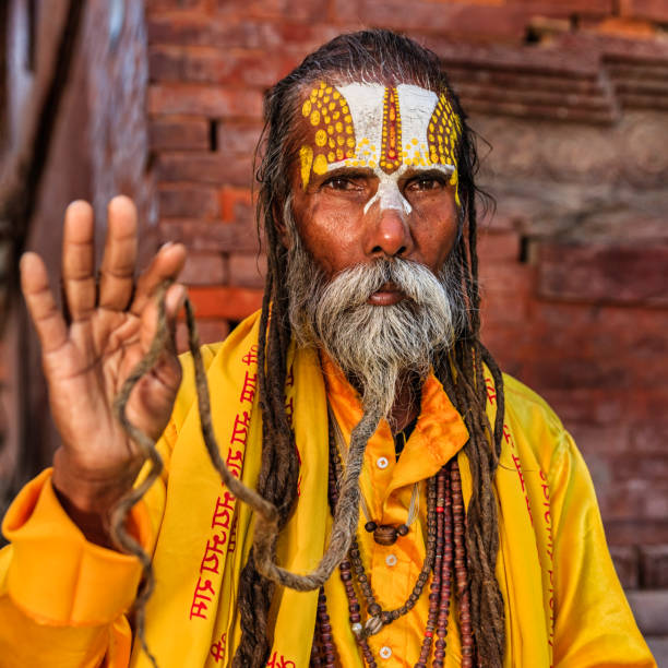 istock Sadhu - indian holyman sitting in the temple 815381434