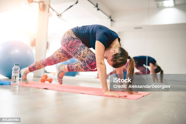 Young Athlete Female In Plank Pose Doing Running Abs Stock Photo - Download Image Now