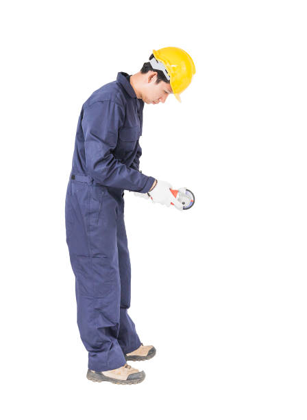 istock Young handyman in uniform hold grinder 815416912