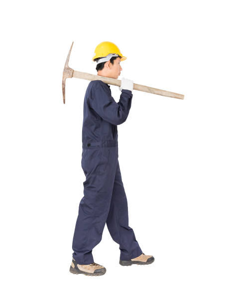 istock Man in uniform hold old pick mattock that is a mining device 815416940