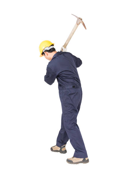 istock Man in uniform hold old pick mattock that is a mining device 815416942