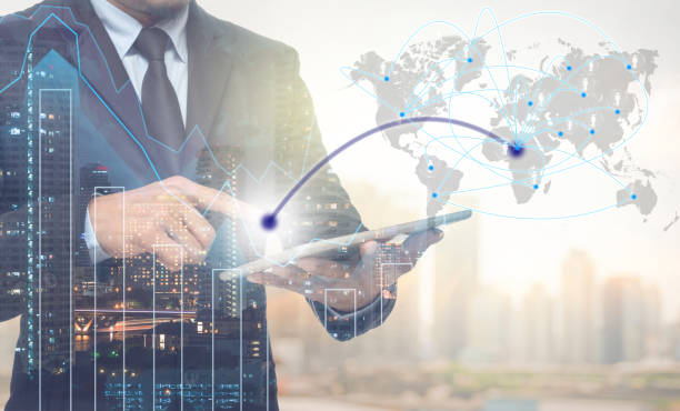 istock Double exposure of businessman using tablet for connection with cityscape and financial graph on blurred building background,Business Trading concept,Elements of this image furnished by NASA 815420276
