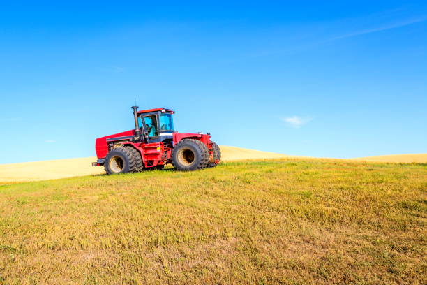 istock Red tractor on the hill,WA 815422892