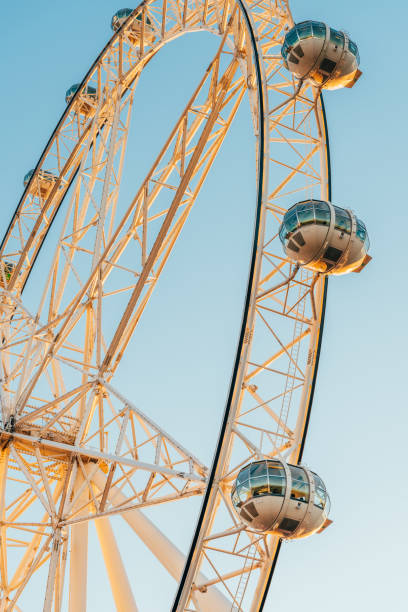 istock sky wheel against beautiful sunlight background. 815433602