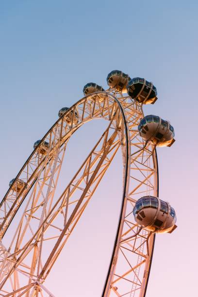 istock sky wheel against beautiful sunlight background. 815433688