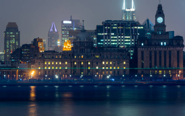 istock City Skyline By River Against Sky at night 815445606