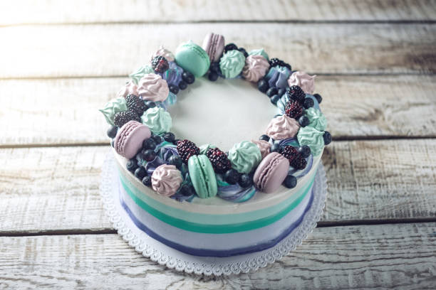istock Homemade cake with berries blackberries, blueberries, meringue and marshmallows 815451106
