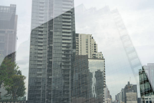 istock Low angle multiple exposure of tall corporate buildings 815468958