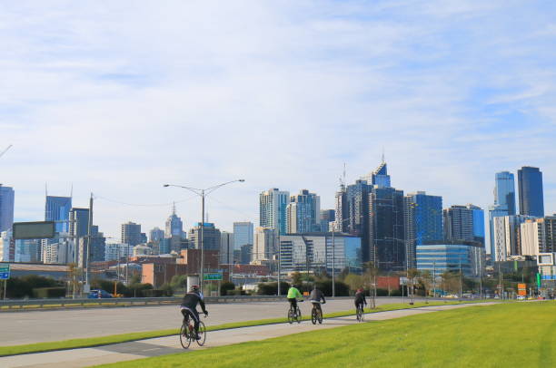 Melbourne Australia - July 2, 2017: Cyclists and Melbourne cityscape Australia