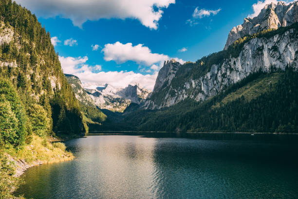 istock Gosausee lake against blue sky and clouds 815488956