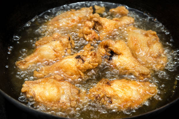 istock chicken wing deep fried on hot vegetable palm oil 815500582