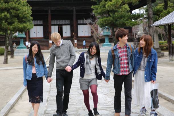 istock Young people are walking at temple precinct 815509544